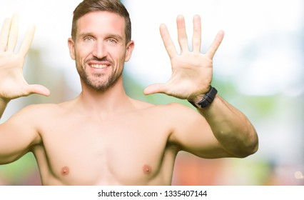 Handsome Shirtless Man Showing Nude Chest Foto Stock 1335407144