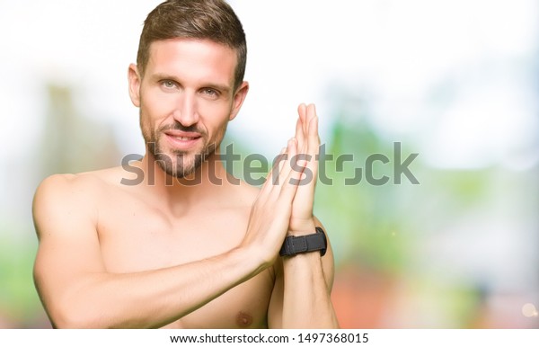 Handsome Shirtless Man Showing Nude Chest Stock Photo