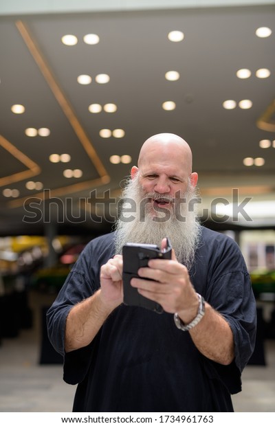 Happy Mature Handsome Bald Bearded Man Stock Photo