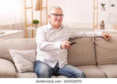 Happy Mature Man Watching Tv Sitting Stock Photo Shutterstock