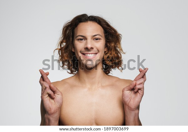 Happy Shirtless Guy Posing Fingers Crossed Stock Photo 1897003699