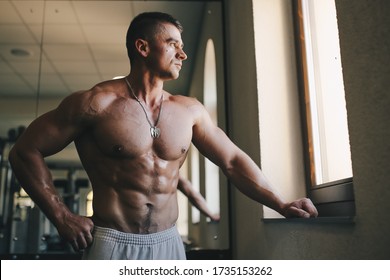 Hard Strength Workout Naked Bodybuilder Exercising Stock Photo