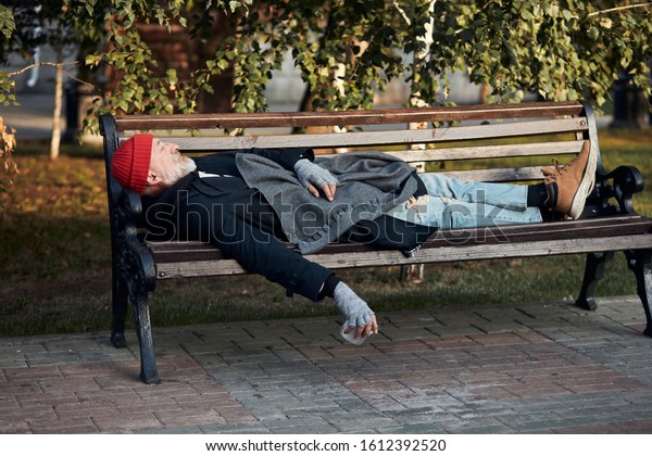 Homeless Man Sleeping On Bench Park Stock Photo Edit Now