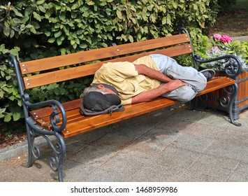 Homeless Man Sleeping On Park Bench Stock Photo 1468959986 Shutterstock