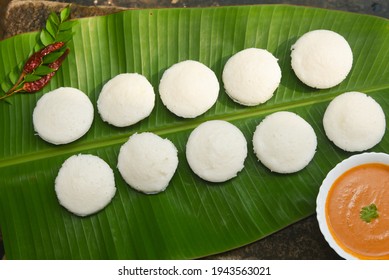 Indian Idly Served On Traditional Banana Stock Photo