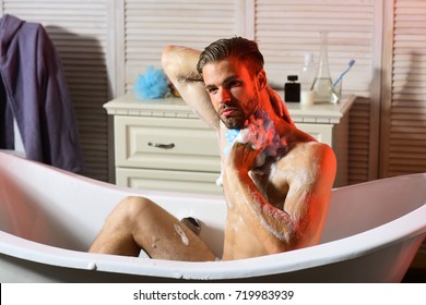 Macho Sitting Naked Bathtub Washing Sponge Stock Photo