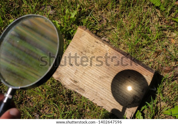 Magnifying Glass Fire Starting Focused On Stock Photo 1402647596