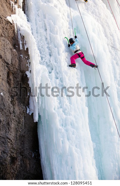 Man Climbing Frozen Waterfall Stock Photo Shutterstock