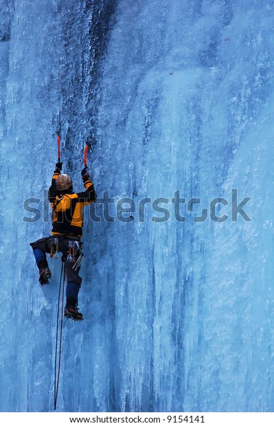 Man Climbing Frozen Waterfall Stock Photo Shutterstock