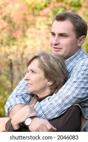 Mature Woman Embraced By Her Son Stock Photo Shutterstock