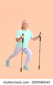 Mature Woman Walking Poles On Color Stock Photo 2059580543 Shutterstock