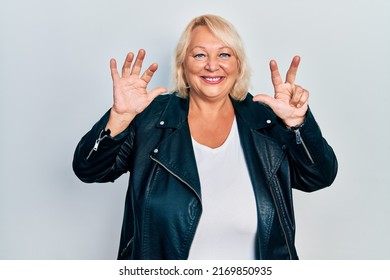 Middle Age Blonde Woman Wearing Leather Stock Photo