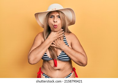 Middle Age Hispanic Woman Wearing Bikini Stock Photo