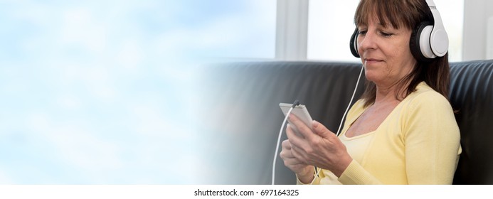 Modern Mature Woman Listening Music On Stock Photo 697164325 Shutterstock