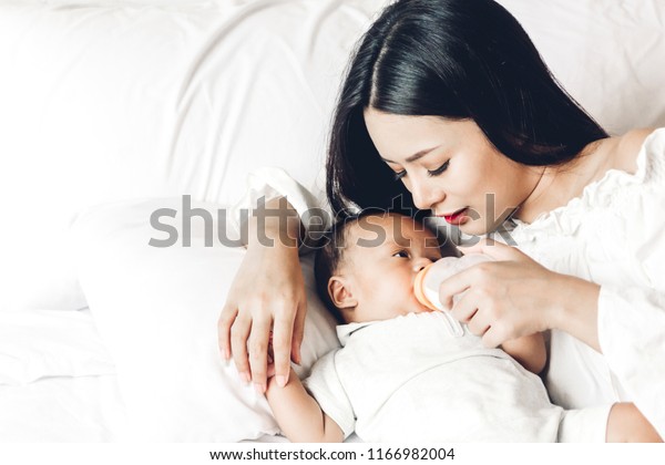 Mother Feeding Baby Milk Bottle Stock Photo Shutterstock