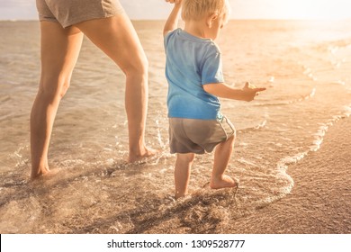 Mother Son Walking On Beach Bare Stock Photo Shutterstock