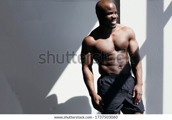 Muscular Darkskinned Man Model Stands Naked Stock Photo 1737503060