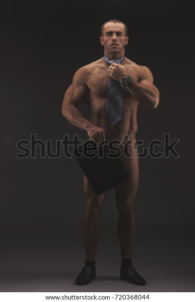 Muscular Sexy Naked Businessman Covering His