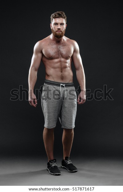 Naked Athletic Man Studio Isolated Dark Stock Photo