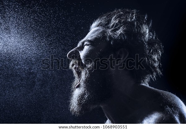 Naked Bearded Man Angrily Screams Into Stock Photo