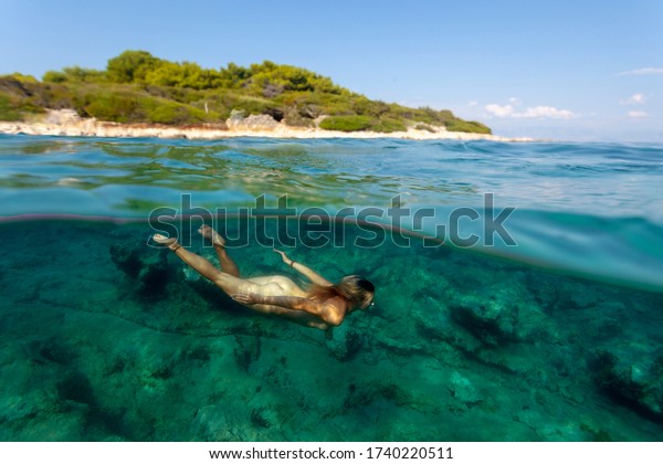 Naked Girl Swimming Diving Naturism Resort Stock Photo