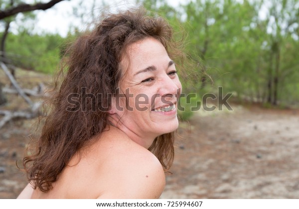 Naked Woman Sitting On Beach Smiling Stock Photo Edit Now