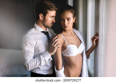 Passionate Beautiful Couple Bedroom Enjoying Foreplay Stock Photo