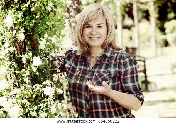 Portrait Cheerful Mature Woman Standing Outdoors Stock Photo