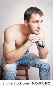 Handsome Shirtless Man Sitting On Couch Stock Photo 516626263