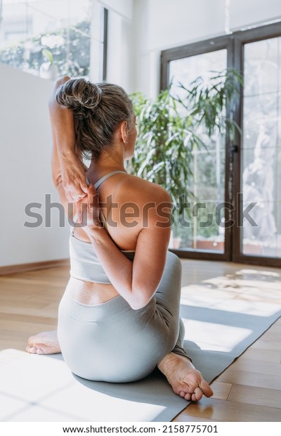 Rear View Fit Woman Doing Gomukhasana Stock Photo 2158775701 Shutterstock