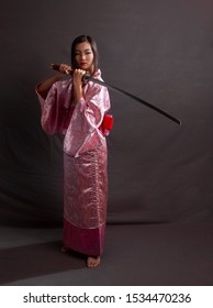 Samurai Kimono Holding Katana Sword Looking Stock Photo 1534470236