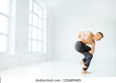 Senior Athletic Man Naked Torso Practising Stock Photo