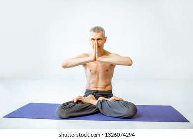 Senior Man Naked Torso Practising Yoga Stock Photo