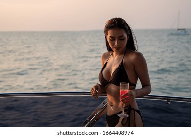 Sexy Asian Women Bikini Champagne Glass Stock Photo