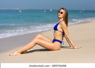 Sexy Beautiful Woman Bikini Sitting Beach Stock Photo 1899742498