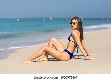 Sexy Beautiful Woman Bikini Sitting Beach Stock Photo 1900972867