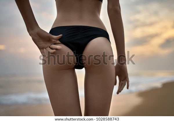 Sexy Girl Stands On Beach On Stock Photo Edit Now 1028588743