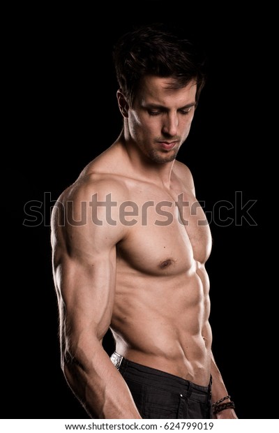 Sexy Shirtless Muscular Male Model On Black Background