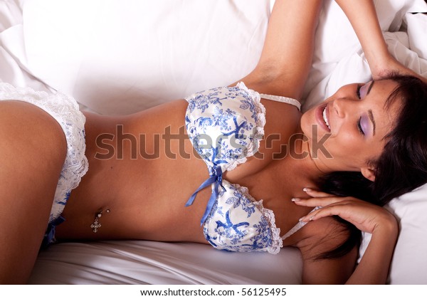 Стоковая фотография 56125495 Sexy Woman Lingerie Lying On Bed