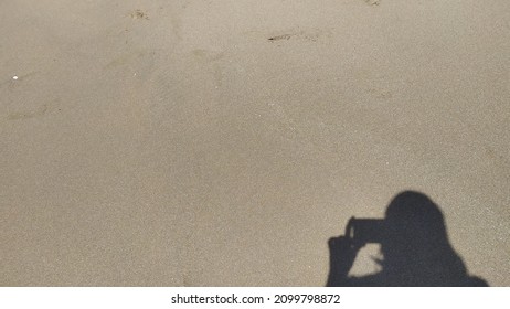 Shadow People Taking Picture Sandy Beach Stock Photo