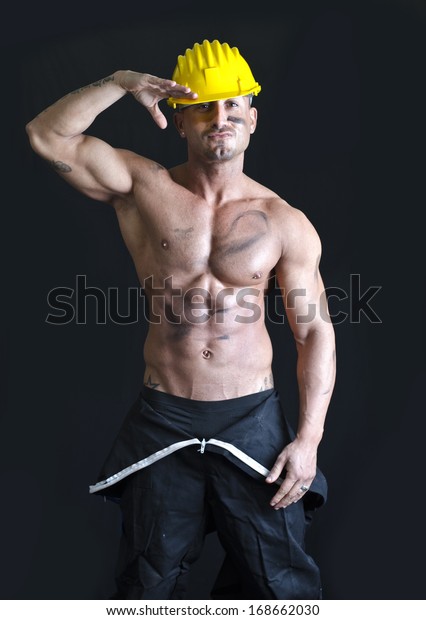 Shirtless Muscular Construction Worker Wearing Coverall Stock Photo