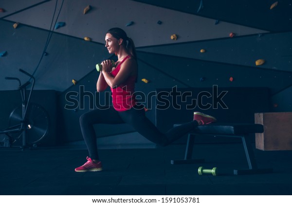 Slim Fit Muscular Brunette Woman Exercise Stock Photo