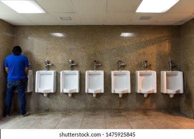 Standing Man Peeing Urinal Public Washroom Stock Photo