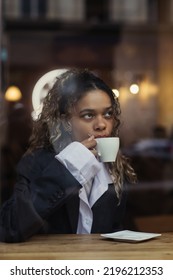 Stylish African American Woman Drinking Coffee Stock Photo 2196212353