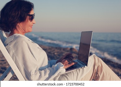 Stylish Attractive Mature Woman Makes Stock Photo