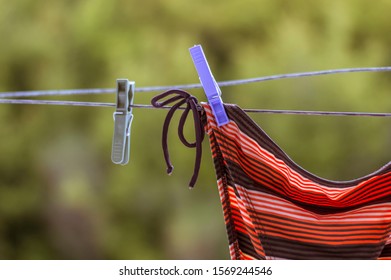 Stylish Brown Bikini Hanging On Clothesline Stock Photo Edit Now