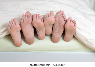 Three Pairs Feet Bed Mixed Stock Photo 293322824 Shutterstock