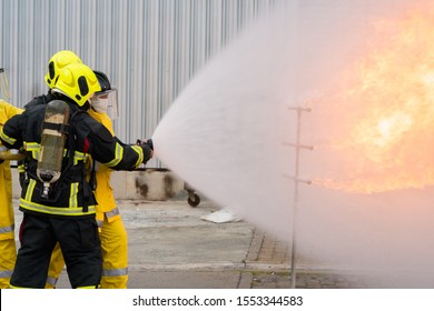 Training Firefighters Spray Water Fire Stock Photo