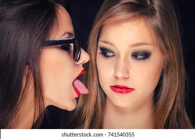 Two Beautiful Lesbian Girls Being Intimate Shutterstock