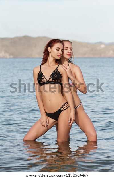 Two Girls Bathing Suits Posing Standing Stock Photo Edit Now